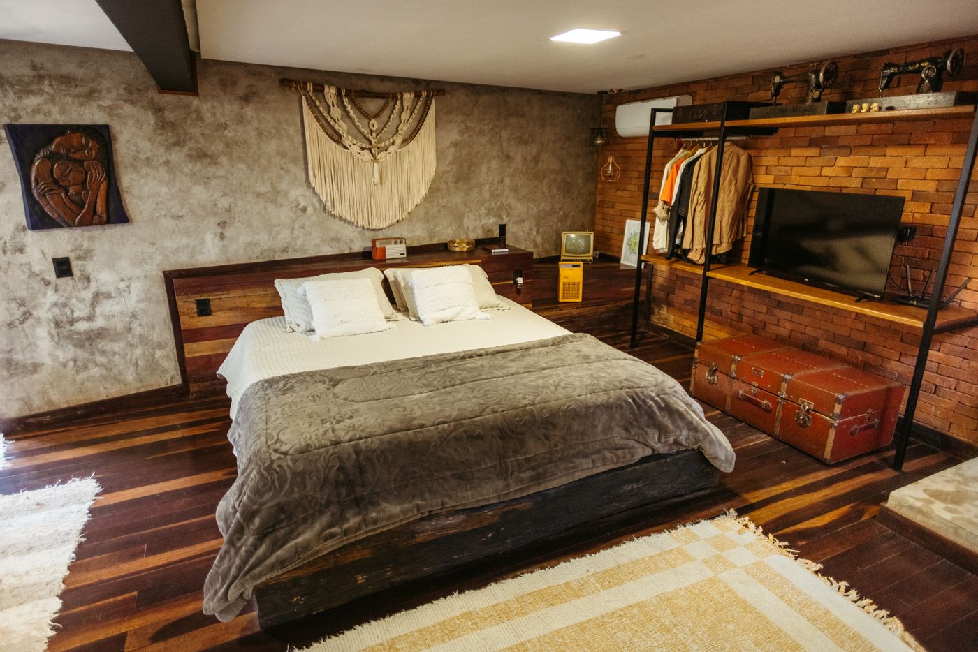 Rustic bedroom in a vacation rental with warm lighting