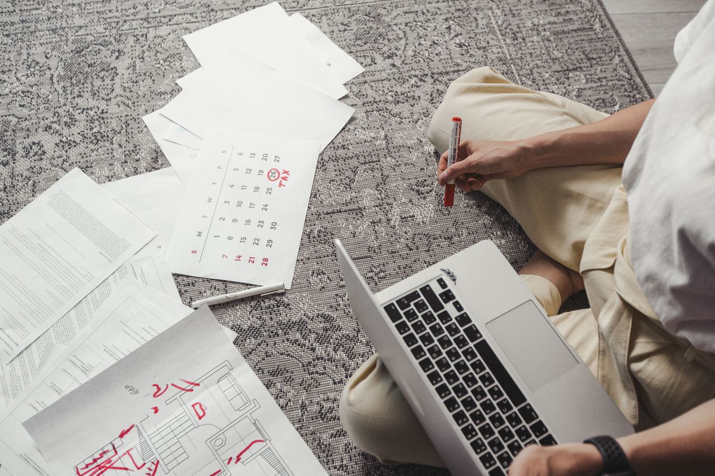 Host planning schedules with a laptop and calendar
